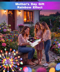 Solar Powered Outdoor Fairy Lights With 8 Modes And 120 Led Firework Effect Multicolor For Garden Yard Path Pool Patio Waterproof Decor Lit Christmas Glow illuminating garden path with women admiring gift box.