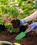Gardener using 30 Piece Mini Garden Shovel Set Colorful Metal Tools With Wooden Handles For Planting Digging Beach Shovels And Soil Work