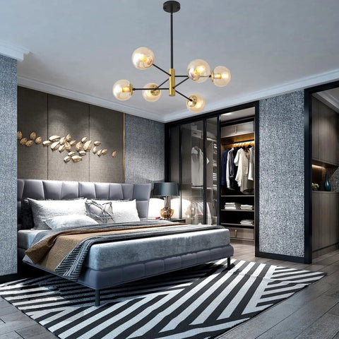 Bedroom featuring Six Light Amber Glass Globe Sputnik Chandelier With Dope Black And Gold Industrial Pendant Lighting