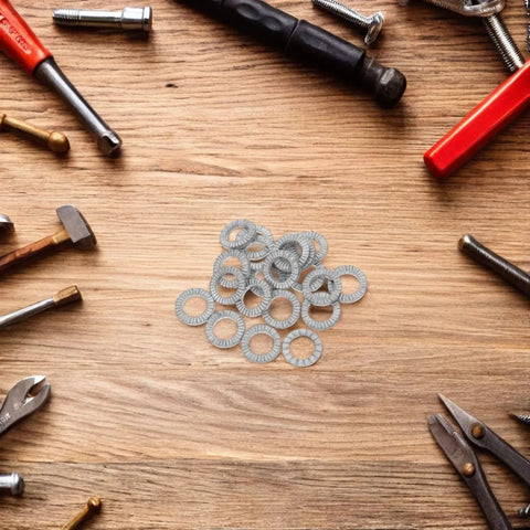 Get Your Garage Ready With These Beefy M10 Manganese Steel Wedge Locking Washers 30 Pairs Set on wooden table with tools.