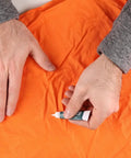 Airstop Vinyl Repair Sealant For PVC And Inflatable Repairs waterproof flexible patching on orange inflatable material