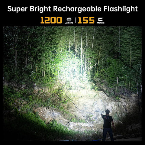 Super Bright High Lumen EDC Flashlight illuminating forest at night, 1200 lumens, 155m beam, person holding flashlight