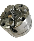 Close-up view of 4 jaw independent chuck for 4 Inch Tilting Rotary Table For Milling Machines with 360 degree horizontal and vertical use.