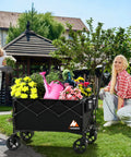 Beast Of A Heavy Duty Collapsible Wagon Cart With Folding Wheels For Grocery Camping And Garden Use filled with plants