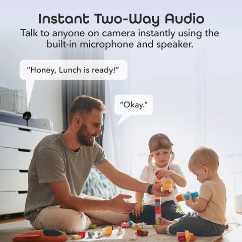 Father playing with children in living room, highlighting 1080P Indoor Security Camera Set, 2 Pack Full HD WiFi Surveillance Cams With 2 Way Audio