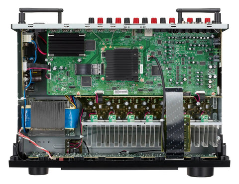 Internal view of 7.2 Channel AV Receiver With Built-In HEOS And 8K HDMI Dope Wireless Streaming Dolby Atmos HDR10 Plus Dynamic HDR DTS X WiFi And Bluetooth Plug And Play Setup For Small To Medium Rooms And Smart Home Vibes, showing circuit board and components.