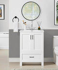 Instant Upgraded Vibes With This 24 Inch Bathroom Vanity Featuring A Built In Ceramic Sink Two Smooth Doors And One Spacious Drawer For Hassle Free Storage Modern White Cabinetry in a stylish bathroom setup.