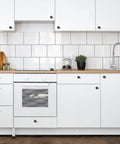Matte Black Kitchen Cabinet Knobs And Pulls 1 1/4 Inch 40 Pack Easy Install Durable Metal Hardware Upgrade For Cabinets Modern Farmhouse Look To Spruce Up Your Space on white kitchen cabinets