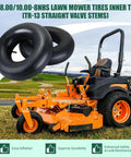 Two Pack 20X8.00/10.00-8 Inner Tubes With TR-13 Valve Stem next to a lawn mower in a field