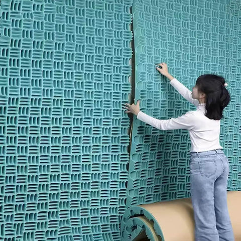 High Density Sound Proofing Foam Panels With Reliable Self Adhesive Back For Studio Home Office Noise Killer Fire Resistant Acoustic Tiles being applied on wall.