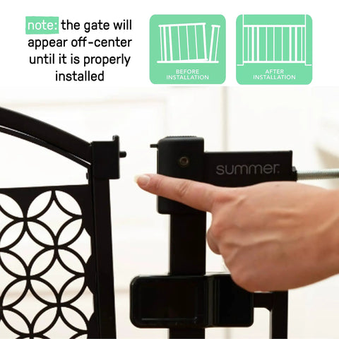 Close-up of black metal hinge on Extra Tall Walk Through Baby Gate For Doorways And Stairs Fits Openings From 28.5 To 48 Inches 36 Inch Tall Black Metal Safety Gate No Drill Pressure Mount Ideal For Babies And Pets At Home during installation with a hand adjusting the gate.