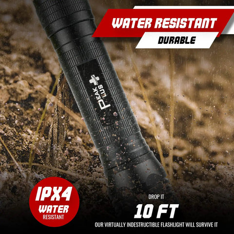 Ultra Bright 1200 Lumen LED Flashlight LFX2000 with water-resistant design, shown in wet outdoor conditions, featuring durable construction.