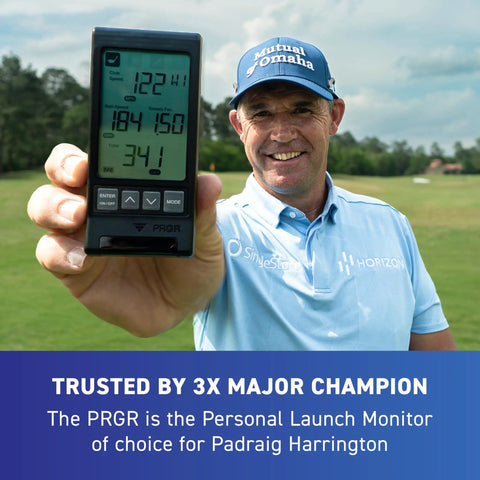 Golfer holding 130A Golf Launch Monitor With Doppler Radar Delivers Club Head Speed Ball Speed Smash Factor Carry And Total Distances
