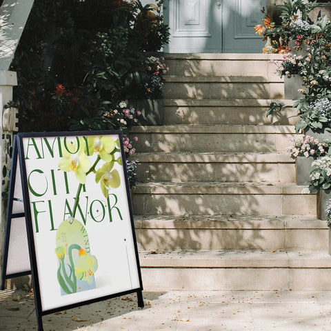 Double Sided A Frame Sidewalk Sign 24x36 Inches Heavy Duty Outdoor Sandwich Board with floral design on a stone staircase