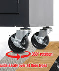 Rolling Tattoo Workstation Cart With Two Lockable Drawers On Wheels Metal Tool Chest With Cabinet And Side Trays Mobile Workbench showing 360° rotating wheels on various floor surfaces.