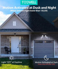 Battery Powered Motion Sensor LED Flood Light With Wireless Detector on garage exterior, auto on at night, waterproof use.