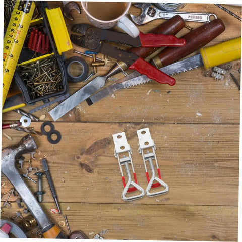 Six Piece Quick Release Toggle Clamp Set on workbench with tools, heavy duty iron, 92x28x14 mm, secure fast versatile applications