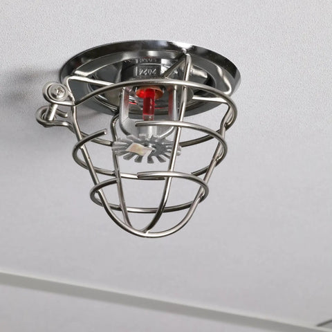 2 Pack Heavy Duty Fire Sprinkler Head Guard Cage For Standard 1/2 And 3/4 Inch NPT Upright Or Pendant Heads featuring a metal cage on a ceiling.