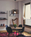 Open Drum 4 Light Modern Farmhouse Chandelier With Interchangeable Walnut And White Ash Wood Panels in dining room setting