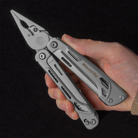 Person holding the Fortitude BF 206 17 In 1 Stainless Steel EDC Multi Tool Pocket Knife With Nylon Sheath for camping and everyday carry.