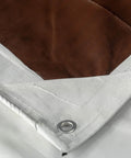 Corner detail of Tough As Nails Waterproof Reversible Tarp 12 By 24 Feet Thick 14 Mil Industrial Grade Tarp With Double Reinforced Corners