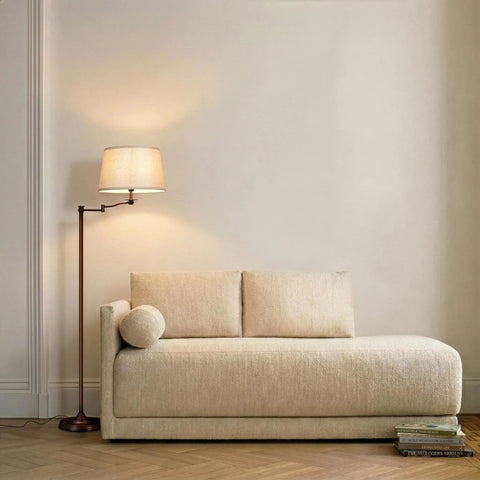 Caden LED Floor Lamp With Swing Arm Tall Bronze Standing Light beside beige sofa, perfect for living room reading and ambiance