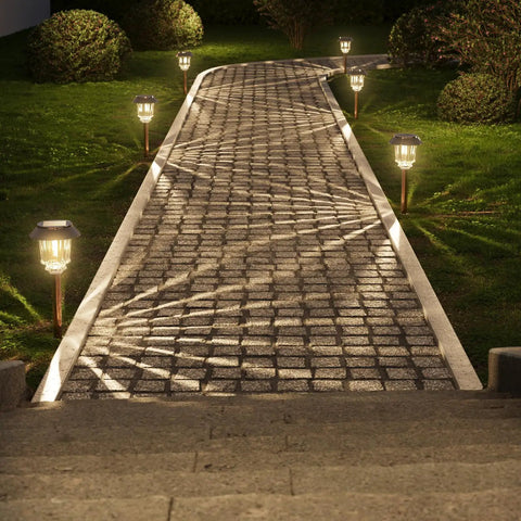 Outdoor Solar Lights 4 Pack Waterproof Garden Pathway Driveway Yard Lights With Auto On Off, illuminating cobblestone path