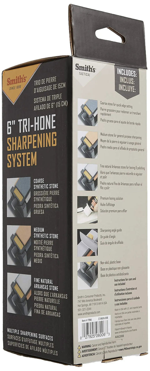 Packaging of Tri Hone Stone Sharpening System Three Way Honing With 1000 Grit Fine Arkansas Stone, 800 Grit Medium Stone, And 300 Grit Coarse Stone on 6-inch stones with instructions visible.