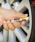 Person using No Sweat Quarter Inch Tire Inflator Extension Hose With Fast Grip Self Locking Chuck on a car tire.