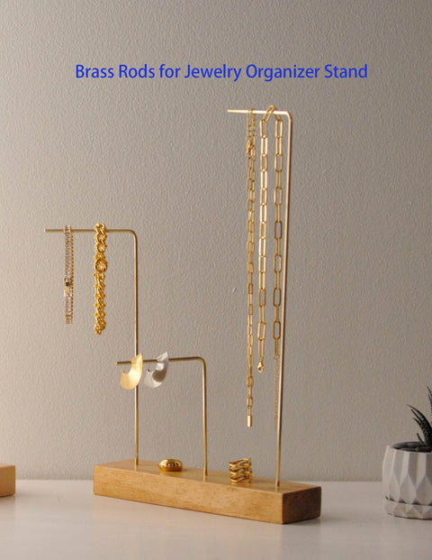 Jewelry organizer stand using brass rods for necklaces and earrings display on wooden base
