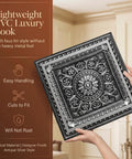 Person holding Antique Silver 2x2 PVC Ceiling Tile Pack Of 10 For Glue-Up Or Lay-In Install, showing embossed design.