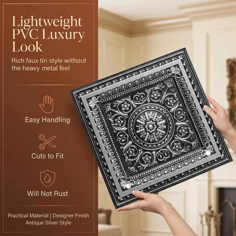 Person holding Antique Silver 2x2 PVC Ceiling Tile Pack Of 10 For Glue-Up Or Lay-In Install, showing embossed design.
