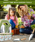 Mother and daughter gardening with All In One Garden Tool Set For Beginners And Weekend Warriors visible with tool bag and tools.