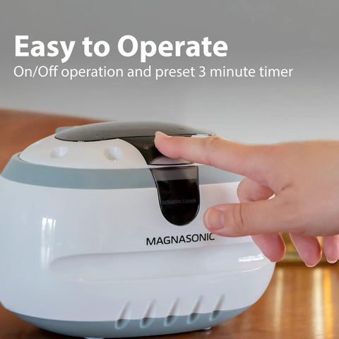 Top Rated Ultrasonic Jewelry Cleaner Delivers A Slick Shine To Eyeglasses Watches Rings Coins Razors And Gadgets Using Just Tap Water For Quick Deep Cleaning That Really Slaps And Leaves Everything Crisp, showing user pressing control.