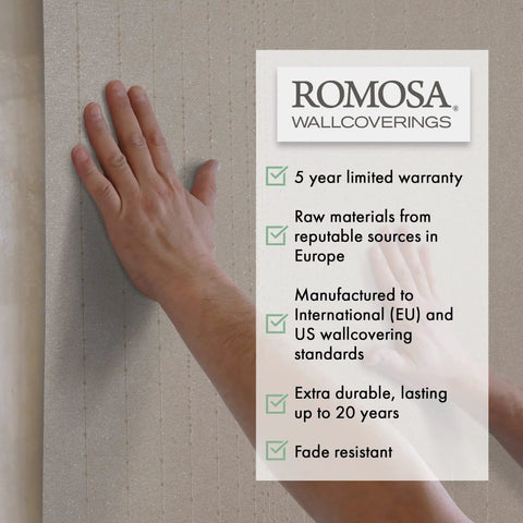 Person touching Premium Paper Backed Vinyl Wall Covering With Gleam Beige Texture Heavyweight Textured Wallpaper Roll with warranty details.