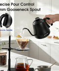 Precision Temperature Control Electric Kettle With 316L Stainless Steel pouring water over coffee in a kitchen setting