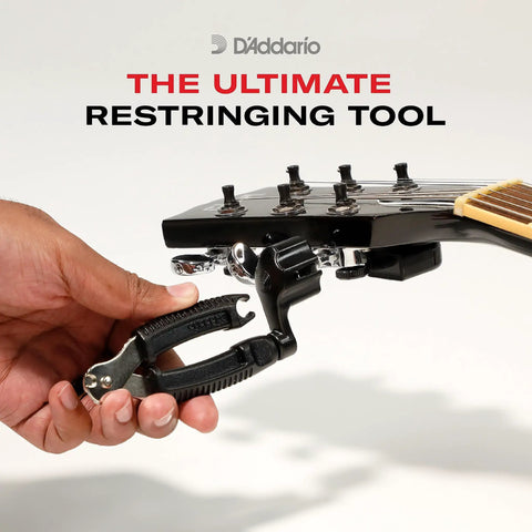 Hand using Pro-Winder All-In-One Guitar Tool With String Winder Cutter Bridge Pin Puller Fast String Changes Ergonomic Grip