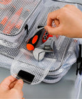 Hassle Free Grab And Go Clear Crossbody Tool Bag Designed For Cleanroom Engineers showing tools in organized compartments.