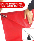 Hands assembling 20 X 24 Inch Dive Flag With Removable Stiffening Pole for scuba diving, freediving, and spearfishing, US legal size.