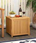 2 In 1 Outdoor Side Table With Storage In Acacia Wood Slatted Design With Umbrella Hole And Removable Base on patio