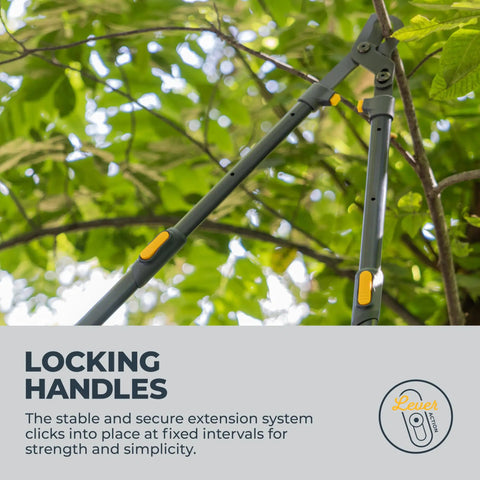 Heavy Duty Extendable Lopper With 25 To 37 Inch Telescoping Handles in extended position against green tree branches.