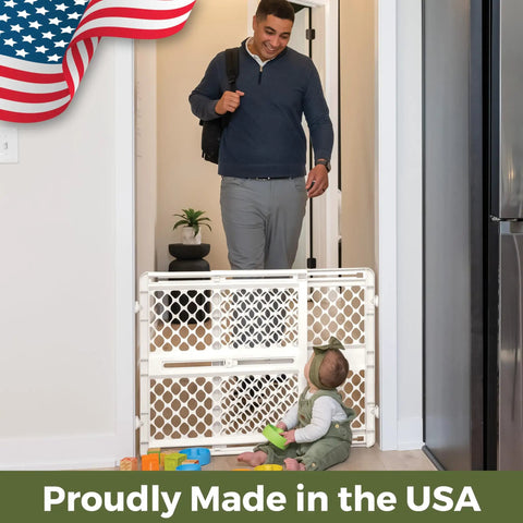 Recycled Plastic Baby Gate Pressure Mounted Doorway Safety Barrier Indoor Outdoor Use No Hassle Setup in a home setting.