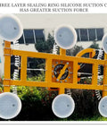 Industrial Electric Glass Lifter Offering Hardcore Vacuum Suction Grips And Multi Cup Handles For Slick Curtain Wall Installations And No Sweat Job Sites featuring four large silicone suction cups.