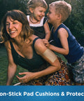 Sheer Adhesive Pad Bandages For Minor Cuts And Scrapes, Extra Large 3 X 4 In on woman's arm, flexible and skin safe.