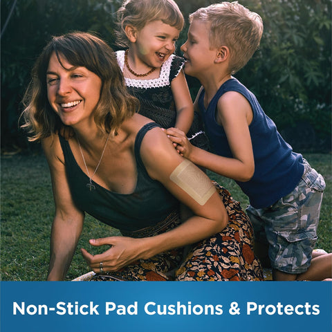 Sheer Adhesive Pad Bandages For Minor Cuts And Scrapes, Extra Large 3 X 4 In on woman's arm, flexible and skin safe.