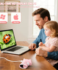 Father and daughter using 1000X Handheld Digital Microscope for Kids with 2 Inch IPS Screen to view ladybug on laptop