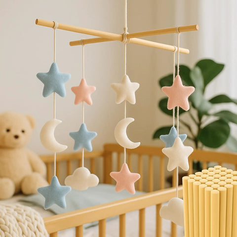 Pack Of Twenty Round Quarter Inch Bamboo Dowel Rods Forty Eight Inches Long Smooth As Silk Premium Natural Craft Sticks For Diy Models Floral Decor And School Assignments A Sweet Makers Stash hanging mobile with felt stars, moons, and clouds in pastel colors.