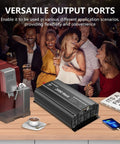 2000W 12V DC To 110V AC Power Inverter With Remote Control And 3 AC Outlets displayed on table at social event