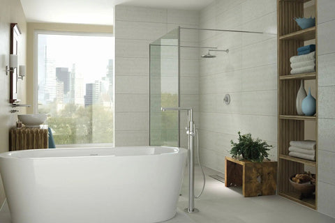 Bathroom with freestanding tub and freestanding tub filler kit with single riser floor mount bracket and water valve for joist installation.