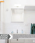 Lit Dual Socket Vanity Light Fixture With Frosted Glass Shade For Wall Mount Bathrooms, above a bathroom sink mirror